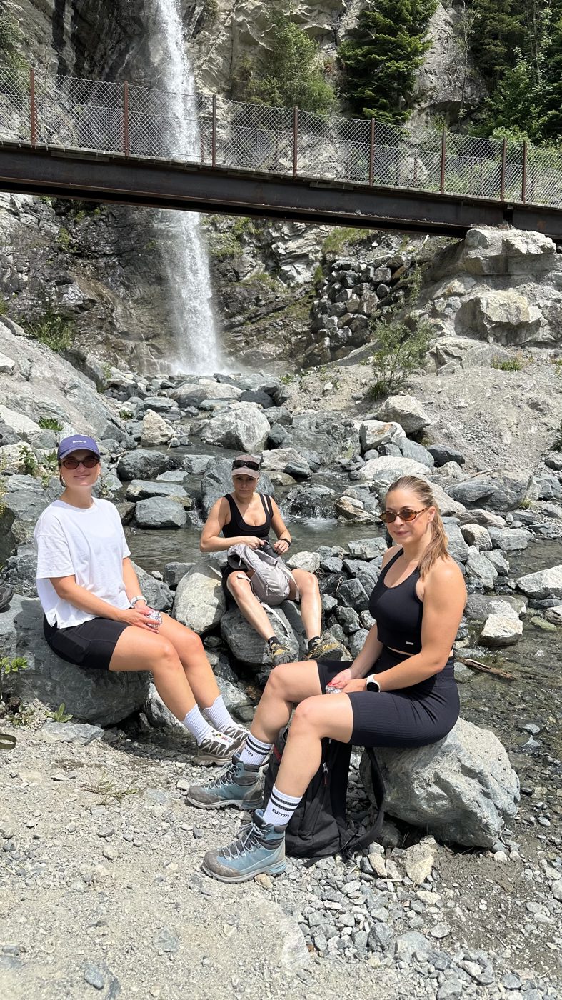 Lunch break by a waterfall during the hike